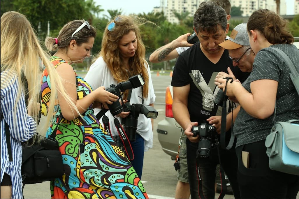 Students learning photography hands-on