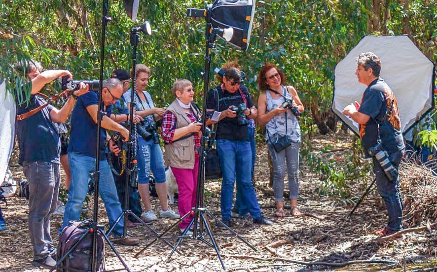 Students practicing camera techniques